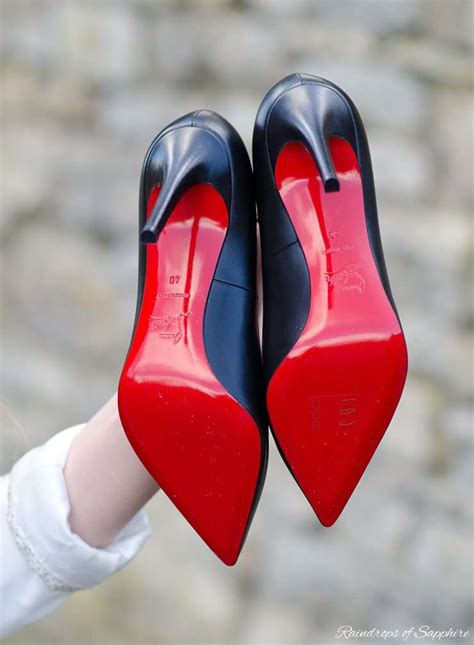 whose shoes have red soles.